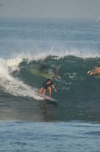 Professional surf coach in Bali guiding student - bali Surf coaching with Putu Surf Bali